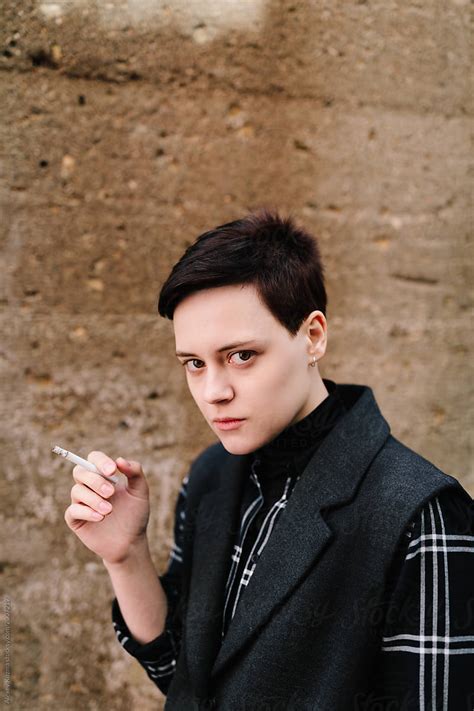 Smoking Lesbian Woman By Stocksy Contributor Alexey Kuzma Stocksy