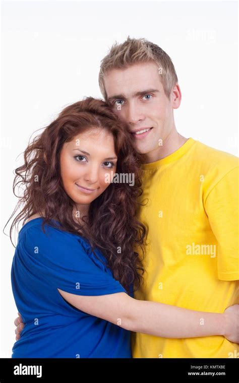 happy young couple - boy embracing girl, smiling - isolated on white ...