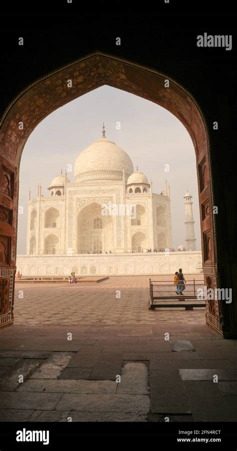 Taj Mahal Ivory White Marble Mausoleum On The South Bank Of Yamuna