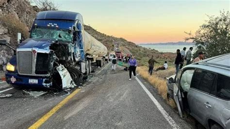 Choque entre camión de carga y autobús deja 46 lesionados y una mujer