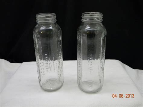 Vintage Glass Baby Bottles Evenflo nursery decor by HeyJunkman