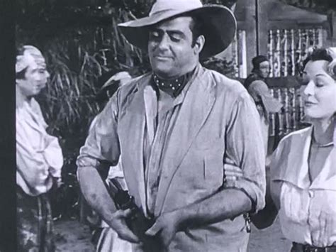 An Old Black And White Photo Of Three People In Cowboy Hats Talking To