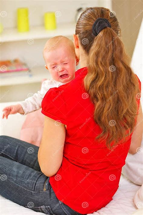 Mother Calming Crying Baby Stock Image Image Of Divan 23026865