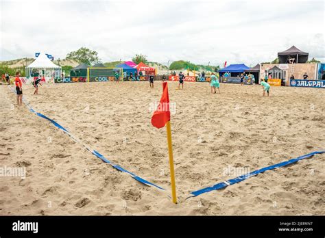 Boys playing beach soccer in summer on the sandy beach Stock Photo - Alamy