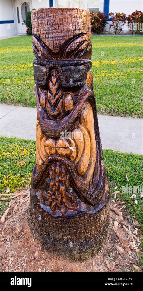 Angry Tiki From A Palm Tree Stump Stock Photo Alamy