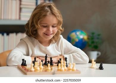 Kids Playing Chess School Photos, Images and Pictures