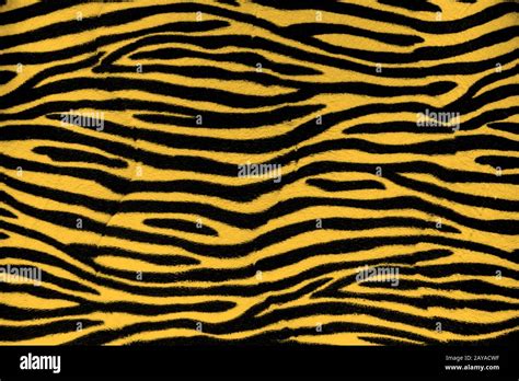 Tiger fur background texture Stock Photo - Alamy