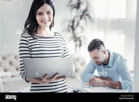 Attractive Brunette Girl Posing On Camera Stock Photo Alamy