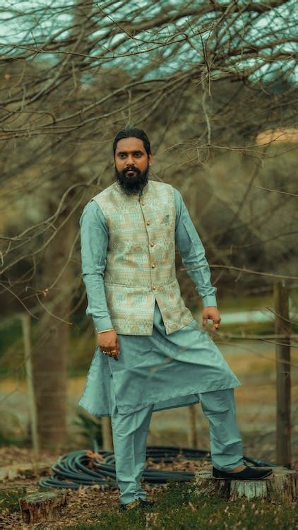 Bearded Man in Traditional Clothing · Free Stock Photo