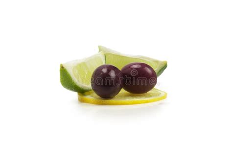 Two Olives And Piece Of Lemon And Lime Isolated On White Stock Image