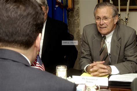 Photo The Honorable Donald H Rumsfeld Right U S