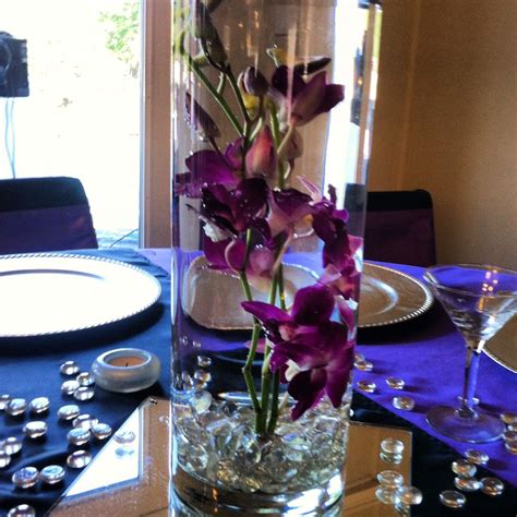 Pin By Brittany Sanchez On Wedding Ideas Submerged Orchid Centerpiece