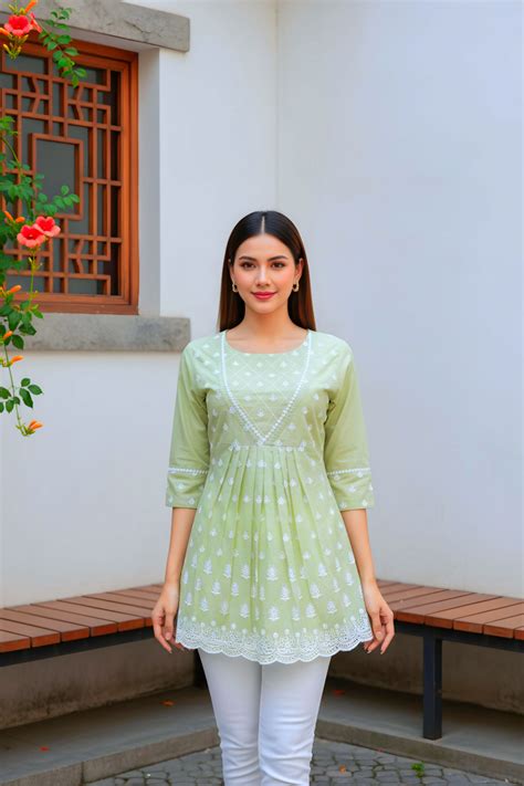women light green chikankari embroidered peplum short kurti