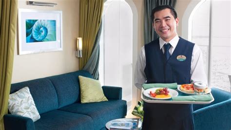 A Steward Delivers Room Service On A Royal Caribbean Ship