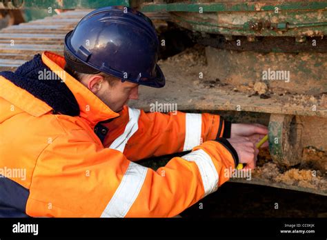 Safety At Work Is Very Important Repairing Crawler Crane Stock Photo