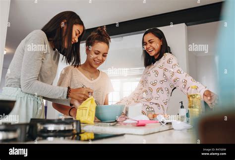 Three Friends Cooking Together Hi Res Stock Photography And Images Alamy