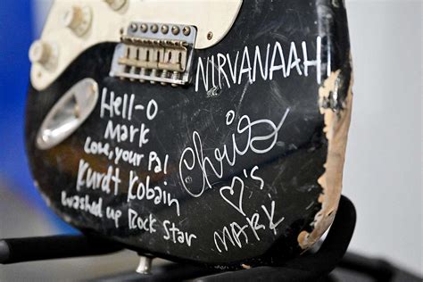 Kurt Cobain S Smashed Nirvana Signed Fender Guitar Sells At Auction