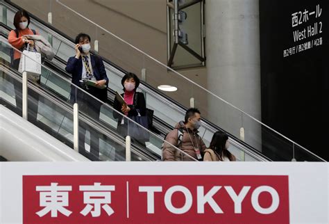 Japan expands COVID state of emergency as people cool to holding Summer