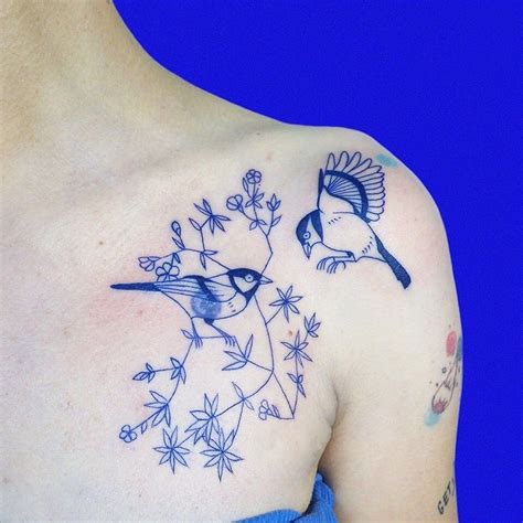 Blue Ink Tattoos