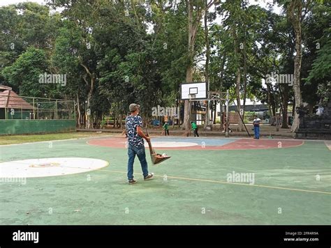 A Photo Of A Janitor Cleaning The Basketball Court Stock Photo Alamy