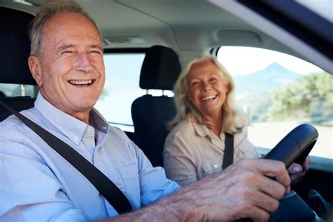 Premium Photo Happy Senior White Couple Driving In Their Car Smiling