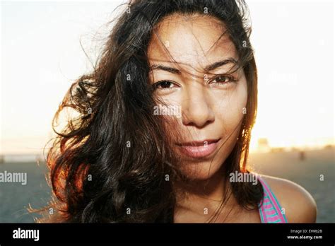 Close up of face of serious Hispanic woman Stock Photo - Alamy