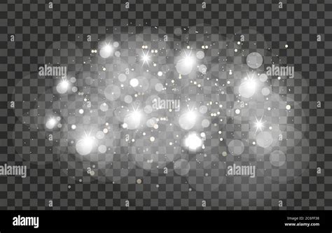 Glowing sparkles glare light effect on a transparent background. Sparks flickering lights ...