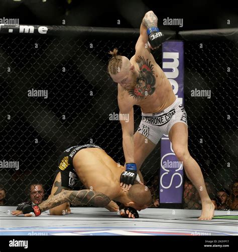 Conor Mcgregor Hits Dustin Poirier During Their Featherweight Mixed