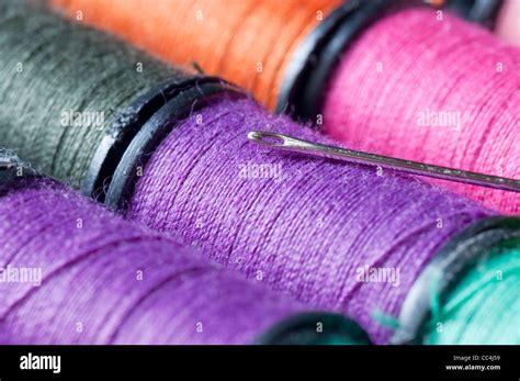 needle and thread Stock Photo - Alamy