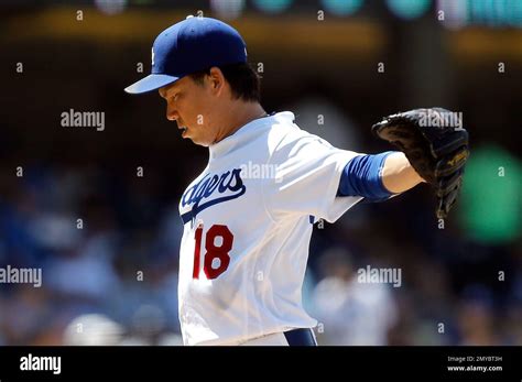 Los Angeles Dodgers Starting Pitcher Kenta Maeda Stretches Before