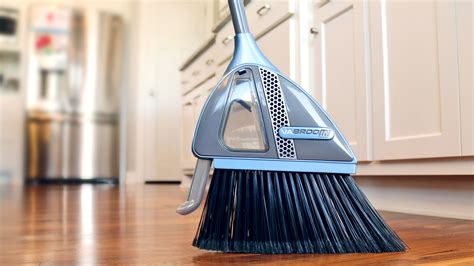 This Smart Broom Sucks Up Debris And Eliminates The Need For A Dust