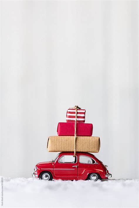 "Toy Car With Stack Of Christmas Gifts" by Stocksy Contributor "Ruth ...