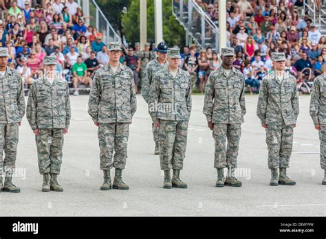 Airmen Standing At Attention During United States Air Force Basic Training Graduation Ceremonies