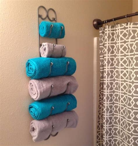 27 Incredibly Clever Storage Ideas For Your Bathroom Towel Rack