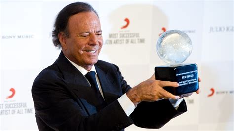 Spanish Singer Julio Iglesias Receives An Award For His Best Selling