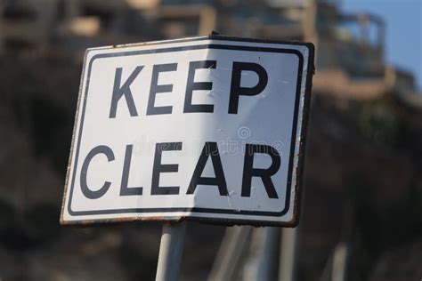 Keep Clear Road Sign in Blue Sky Background, Vertical. Stock Image ...