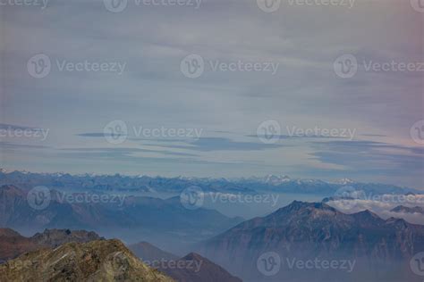 hiking in the swiss alps 12959110 Stock Photo at Vecteezy