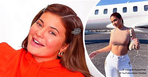 Kylie Jenner Shows Off Toned Figure In Chic White Pants And Nude Top Next To A Private Jet