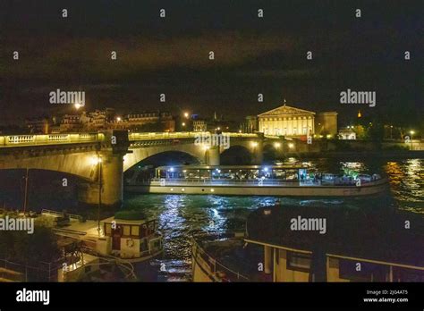 Pleasure Boat Under The Concorde Bridge And The Ministry Of Justice At