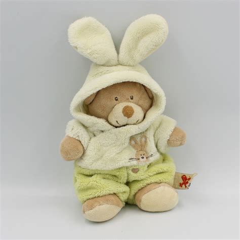 doudou ours déguisé en lapin blanc vert NICOTOY