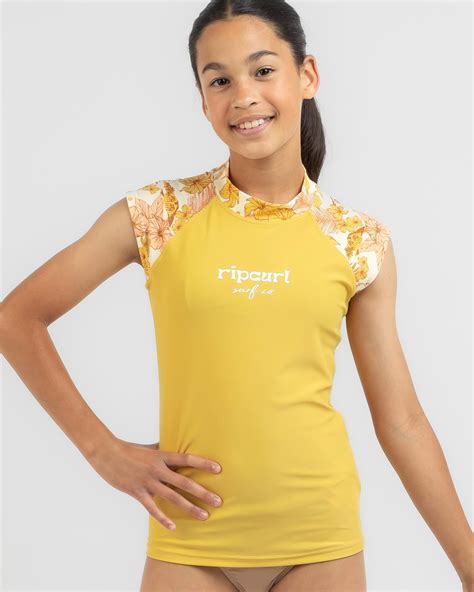 Shop Rip Curl Girls Cosmic Paradise Short Sleeve Rash Vest In Honey Fast Shipping And Easy