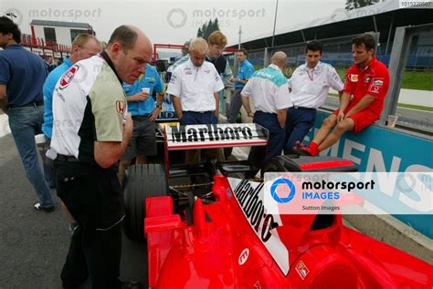 Jock Clear GBR BAR Senior Race Engineer Inspects The Ferrari F2002