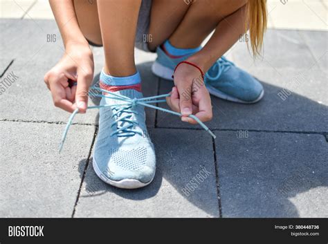 Girl Tying Laces On Image And Photo Free Trial Bigstock