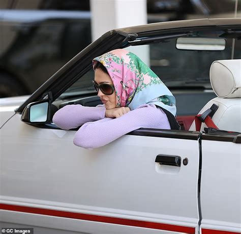 Amelia Gray Hamlin Flashes Her Toned Midriff In A Nude Skin Tight Crop Top As She Poses For