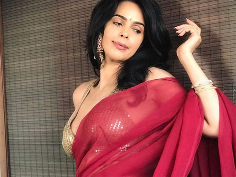 Actress Mallika Sherawat Hot Pics In Saree Gallery