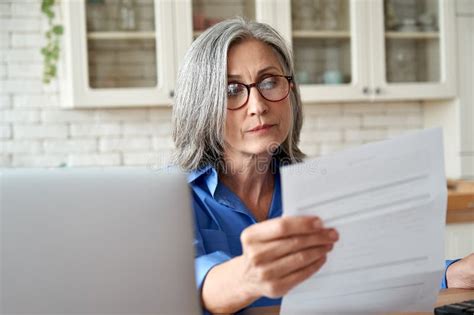 Happy Mature Older Woman Video Calling On Laptop Working From Home Stock Image Image Of Lady
