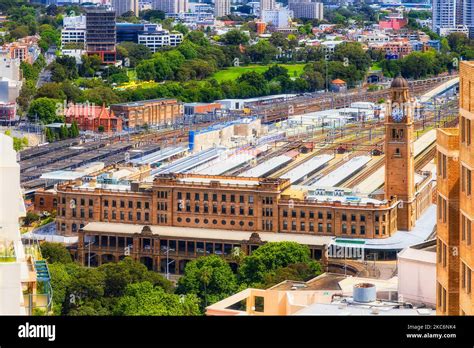 Central railway station in city of Sydney CBD downtown with trains and platforms from elevation ...