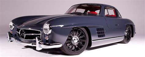 An Old Mercedes Sports Car Is Shown In This Image