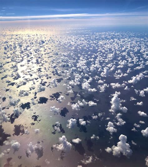 an aerial view of the sky and clouds