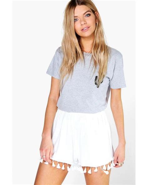 Boohoo Ria Tassel Trim Flippy Shorts In Black Ivory Lyst